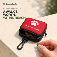 Red Trail Treat Pouch partially open with a small handful of treats within reach.