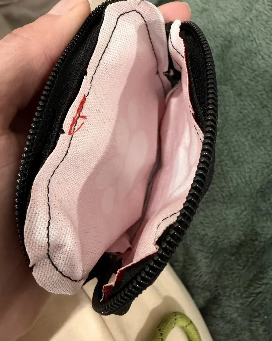 Roam Bark treat pouch clipped close at hand during a dog walk